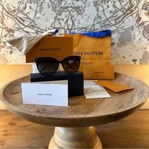 Louis Vuitton First Round sunglasses.